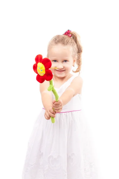 Cute little girl with toy flower isolated — Stock Photo, Image