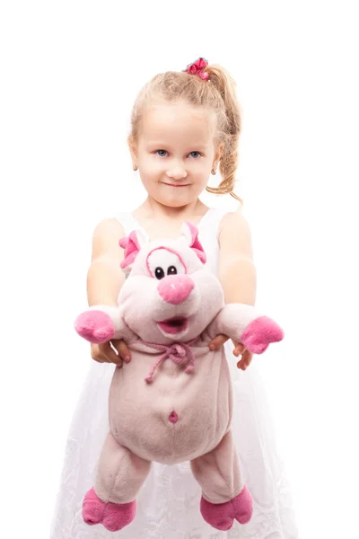 Cute little girl hold toy pig isolated — Stock Photo, Image