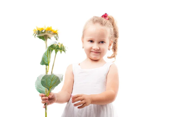 Cute little girl with toy flower isolated — Stock Photo, Image