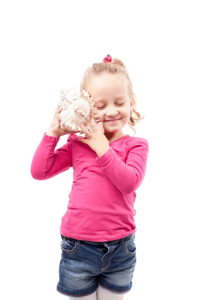 Little girl hold shell isolated on white — Stock Photo, Image