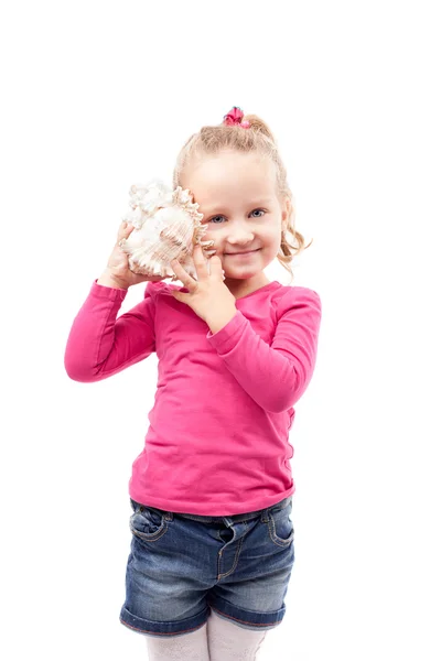 Little girl hold shell isolated on white — Stock Photo, Image