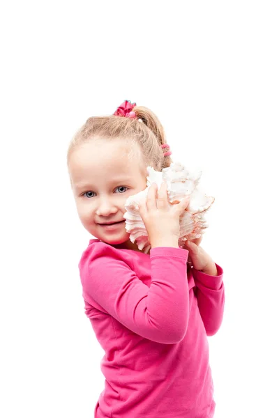 Little girl hold shell isolated on white — Stock Photo, Image