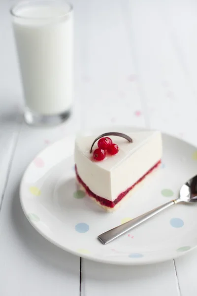 White cheesecake with red berries on a wooden table. Still life — Stock Photo, Image