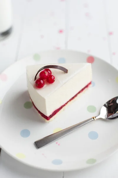 White cheesecake with red berries on a wooden table. Still life — Stock Photo, Image