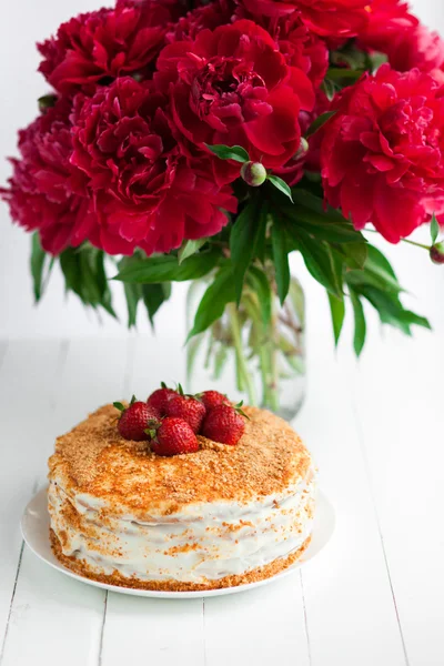 Strawberry cake on table, still life