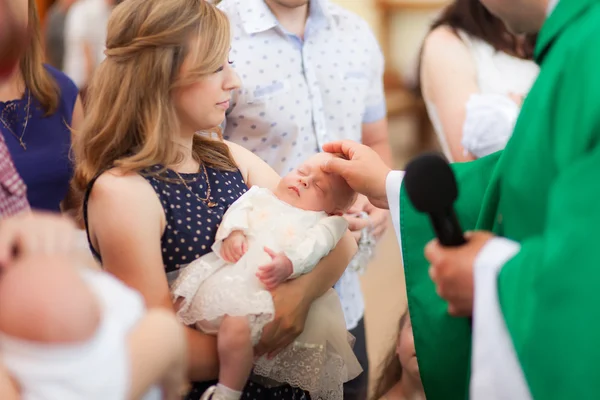 Little girl on ceremony of child christening in church — Stock Photo, Image