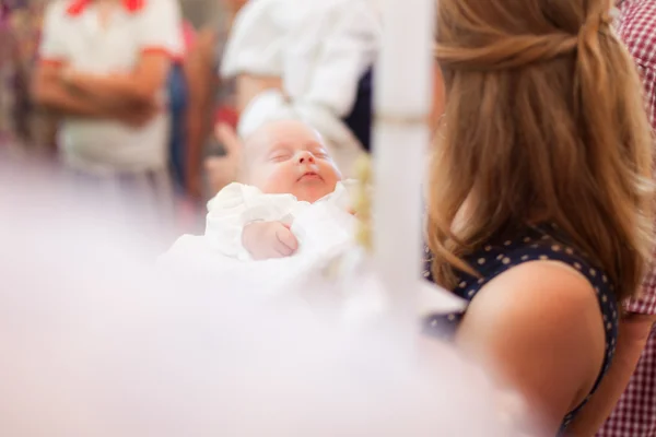 Little girl on ceremony of child christening — Stock Photo, Image