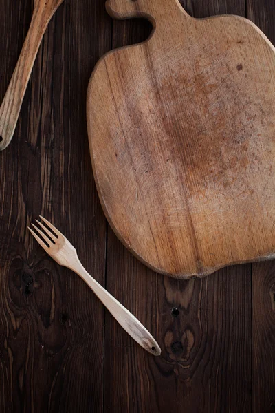 Tenedor de madera sobre mesa vieja — Foto de Stock