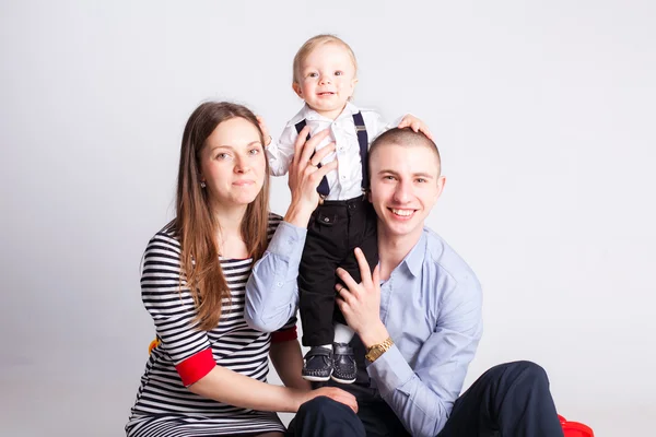 Parents holding son — Stock Photo, Image