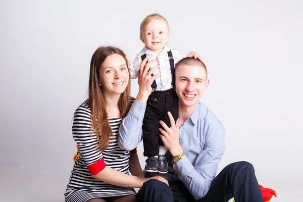 Smiling parents with child — Stock Photo, Image