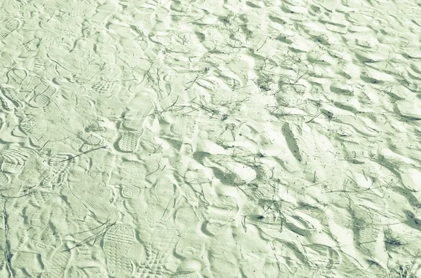 Stopy v písku s více barevným filtrem — Stock fotografie