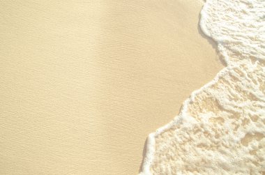 kum plaj su arka plan