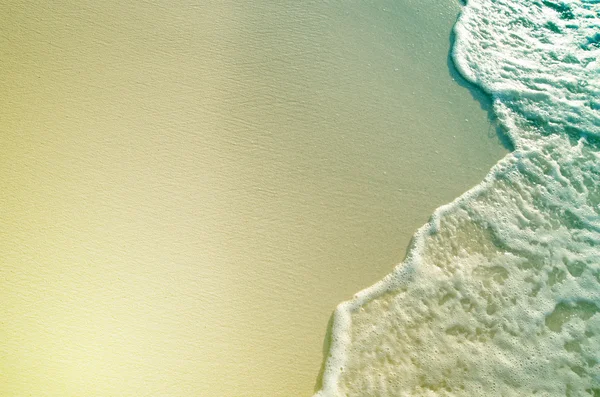 Praia de areia fundo de água — Fotografia de Stock