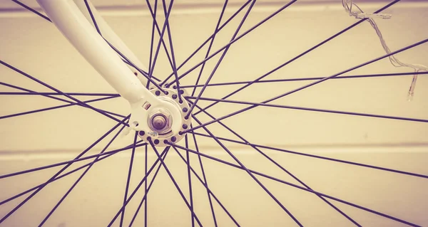 Close up of bicycle wheels prosecc in vintage retro style — Stock Photo, Image