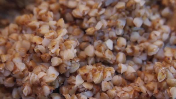Buckwheat porridge. Macro shot. — Stock Video