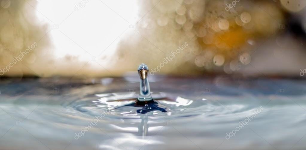 Water Droplet Landing In Water