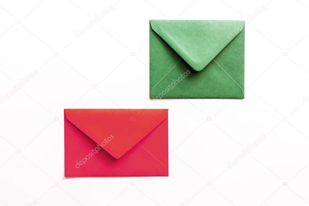 Set of christmas envelopes on white. Top view, flat lay, copy space.