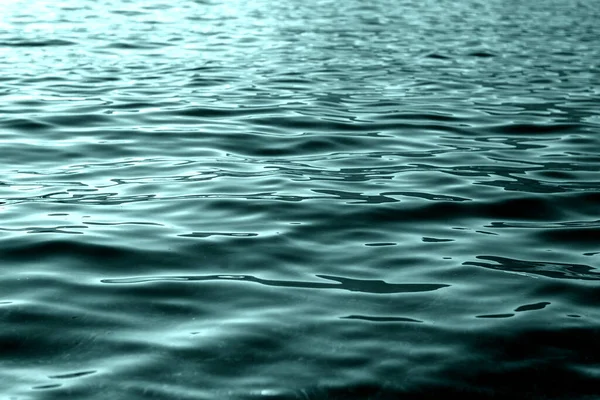Gezeitenwasser grün Wasser Wellen Oberfläche Hintergrund Bewegungsmuster — Stockfoto