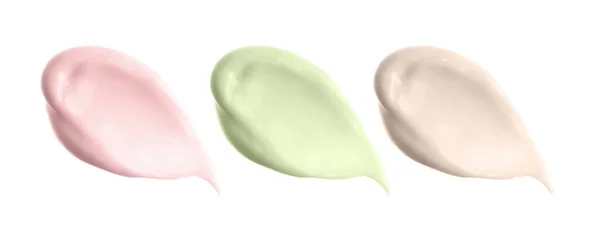 Различные кремовые мазки выделяют пятна. Косметический солнцезащитный крем, образцы крема bb cc. Разнообразие капель косметики. — стоковое фото
