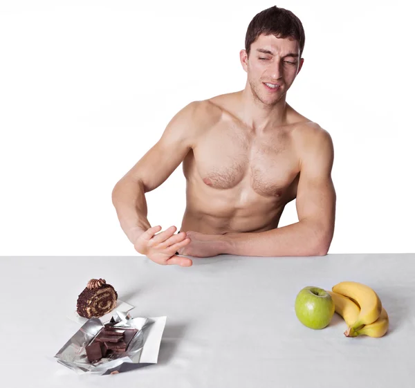Mann med frukt og kake – stockfoto