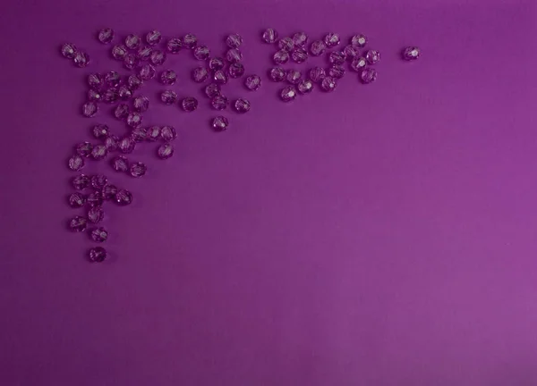 purple beads on a purple background