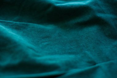 Dark green cotton velvet fabric as background