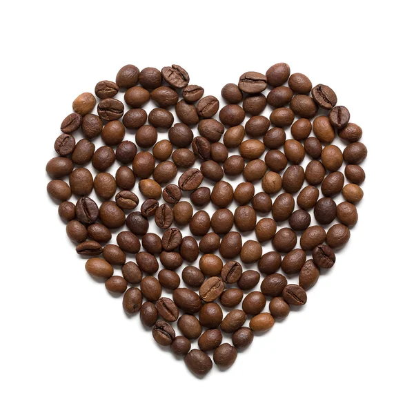 Roasted coffee beans placed in shape of heart — Stock Photo, Image