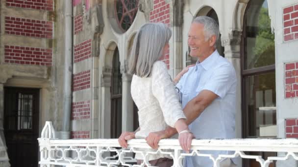 Senior couple on balcony — Stock Video