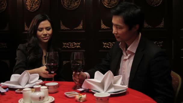 Couple toasting in restaurant — Stock Video