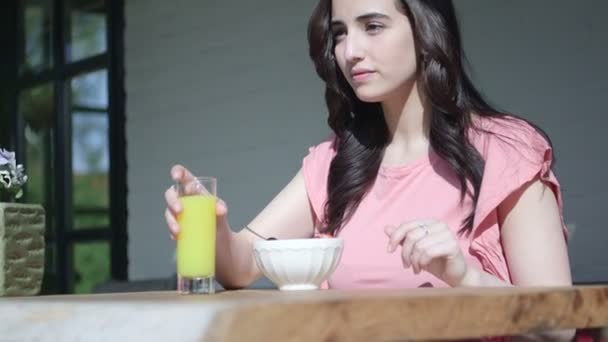 Woman drinking juice — Stock Video