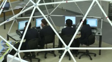 Man teaching students