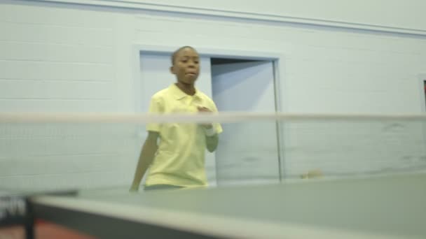 Boy playing table tennis — Stock Video