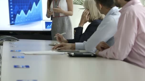 Businesswoman explaining in board room — Stock Video