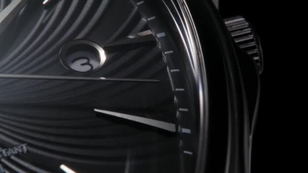 Closeup of rotating black luxury swiss watch — Stock Video