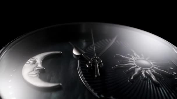 Rotating swiss watch with moon and sun closeup — Stock Video