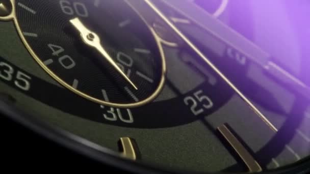 Swiss watch with running arrows turning on camera — стокове відео