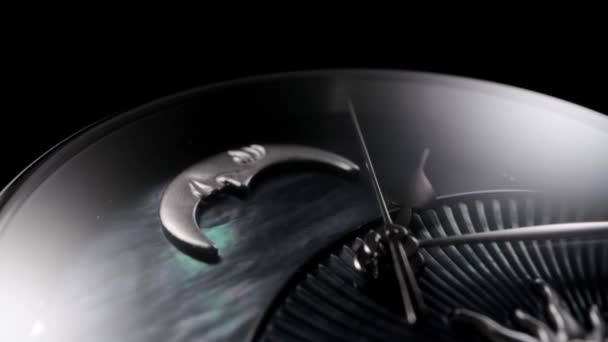 Rotating swiss watch with moon and sun closeup — Stock Video