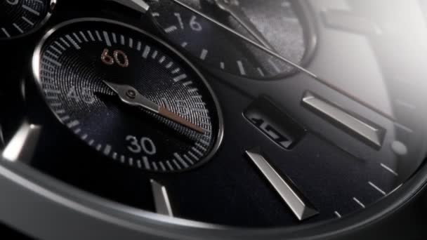 Крупный план темно-синих швейцарских часов с хронографом — стоковое видео