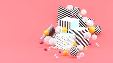 Pembe arkaplandaki renkli toplarla çevrili grafiksel kutu durağı..