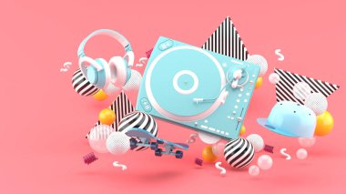 Mavi pikap, kep, kaykay ve mavi kulaklıklar mor arkaplandaki renkli toplar arasındadırlar.