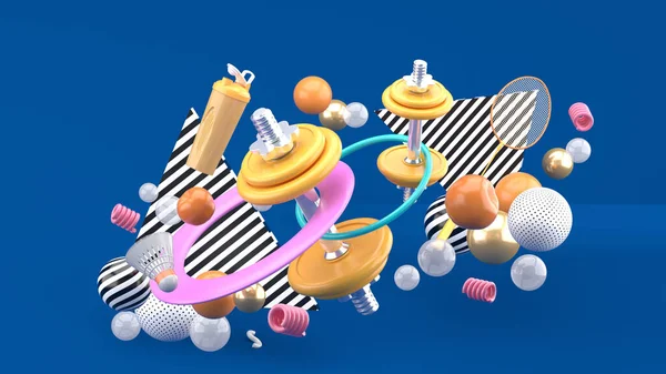 Dumbbells, badminton rackets, water bottles and a hula hoop among colorful balls on a blue background.-3d rendering.