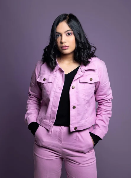 Portrait of Young Confident Women in pink With attitude on white