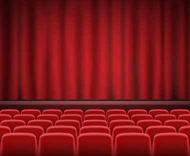 Kırmızı sinema veya tiyatro koltukları gösteri sahne önünde satırları