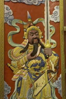 Muhafızlar Tapınakta bir kapıda Çince.  .