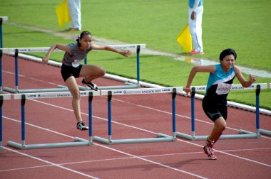 100 m. Hurdles in Thailand Open Athletic Championship 2013. clipart