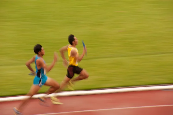 Эстафета 4х400 м. Открытый чемпионат Таиланда по легкой атлетике 2013 . — стоковое фото