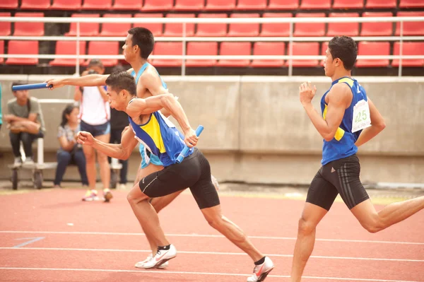 Relay in Thailand Open Athletic Championship 2013. — Stock Photo, Image