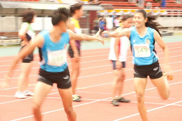 Relay in Thailand Open Athletic Championship 2013. — Stock Photo, Image