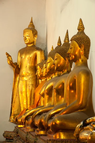 Group of Buddhas in the wall at church . — Stock Photo, Image