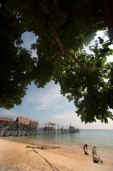 Beach and traditional wooden bridge. — Stock Photo, Image